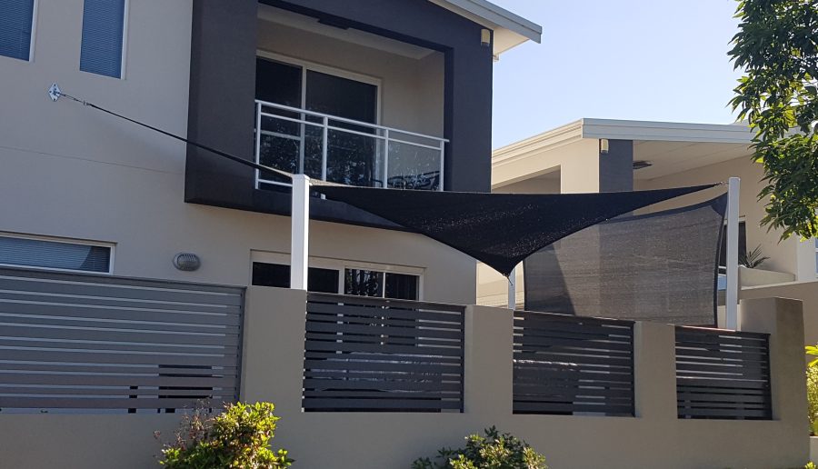 Doubleview shade Sail and Privacy Screen over a spa