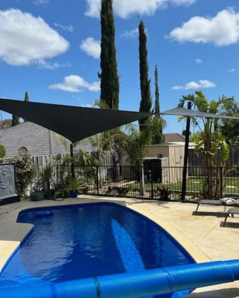Tapping Shade Sail over pool