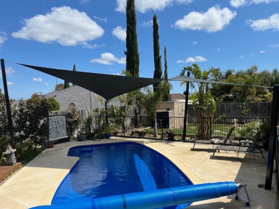 Tapping Shade Sail over pool