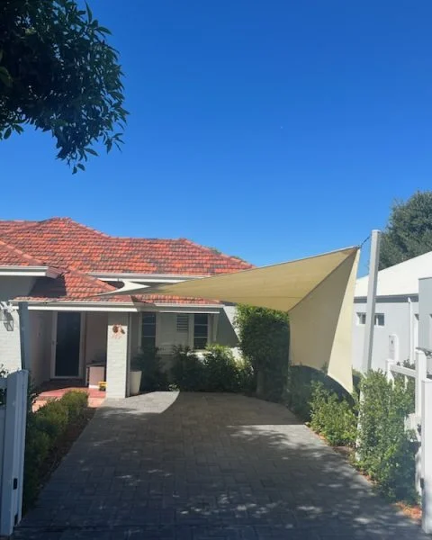 Bayswater Shade Sail with vertical wrap down Sail