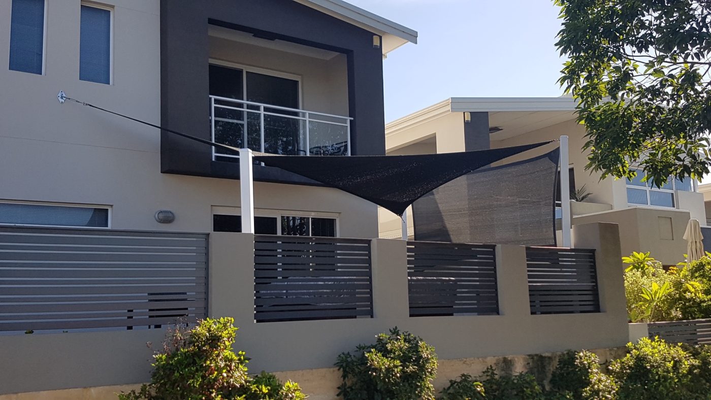 Shade sail with matching privacy screen in Doubleview